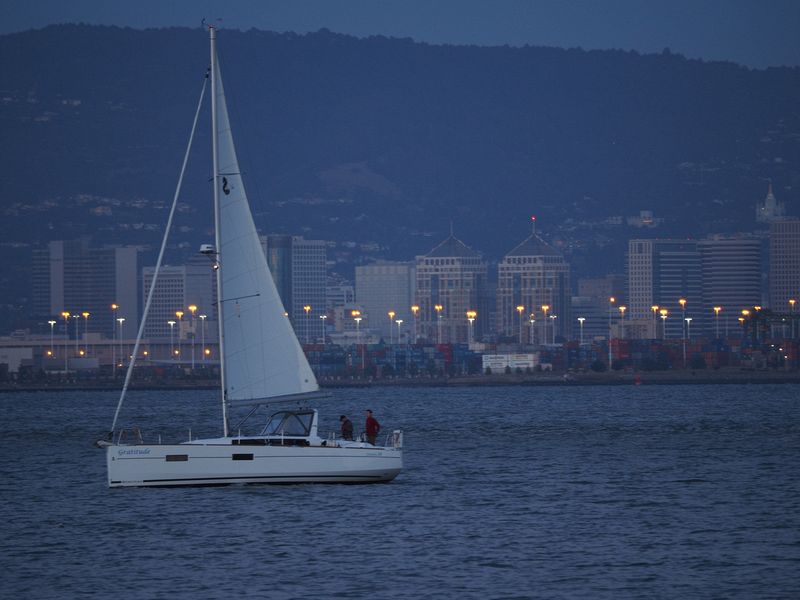 Gratitude sailboat with downtown Oakland in the background